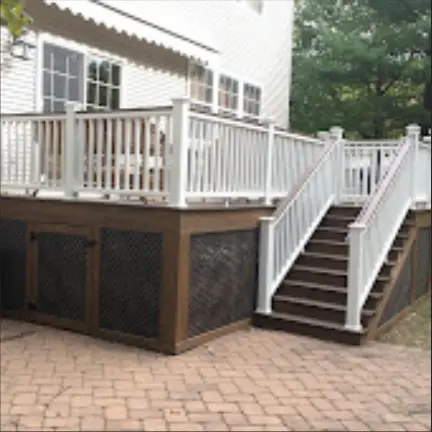 Raised deck stairs with white railing