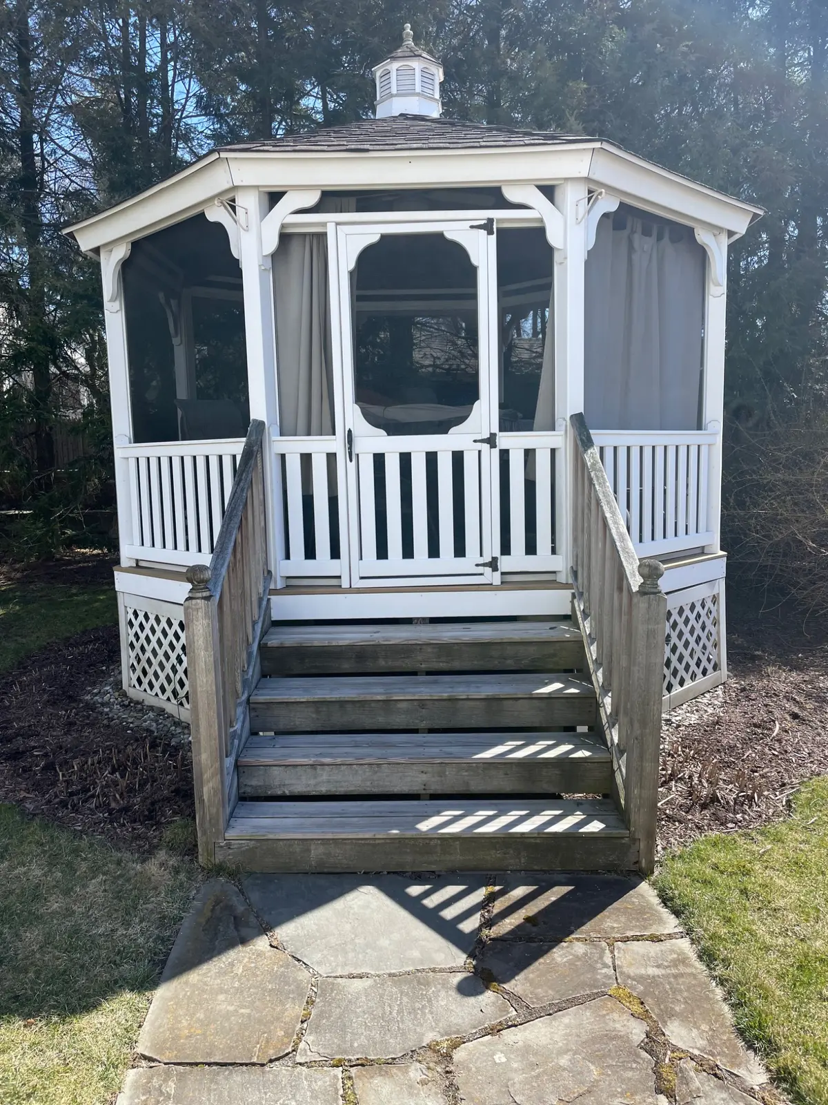 Weathered gazebo stairs before replacement