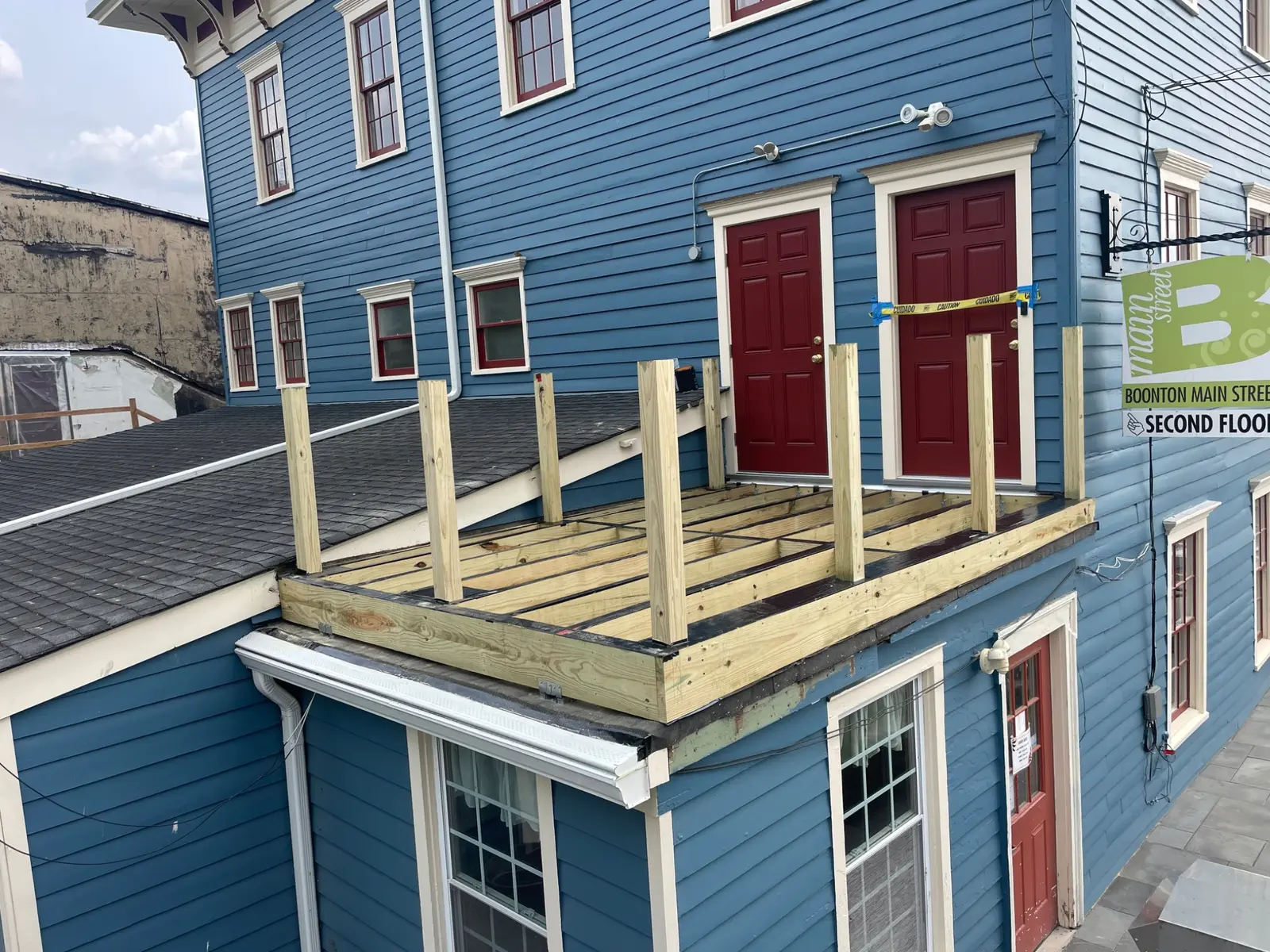 Pressure-treated deck framing and railing posts during construction