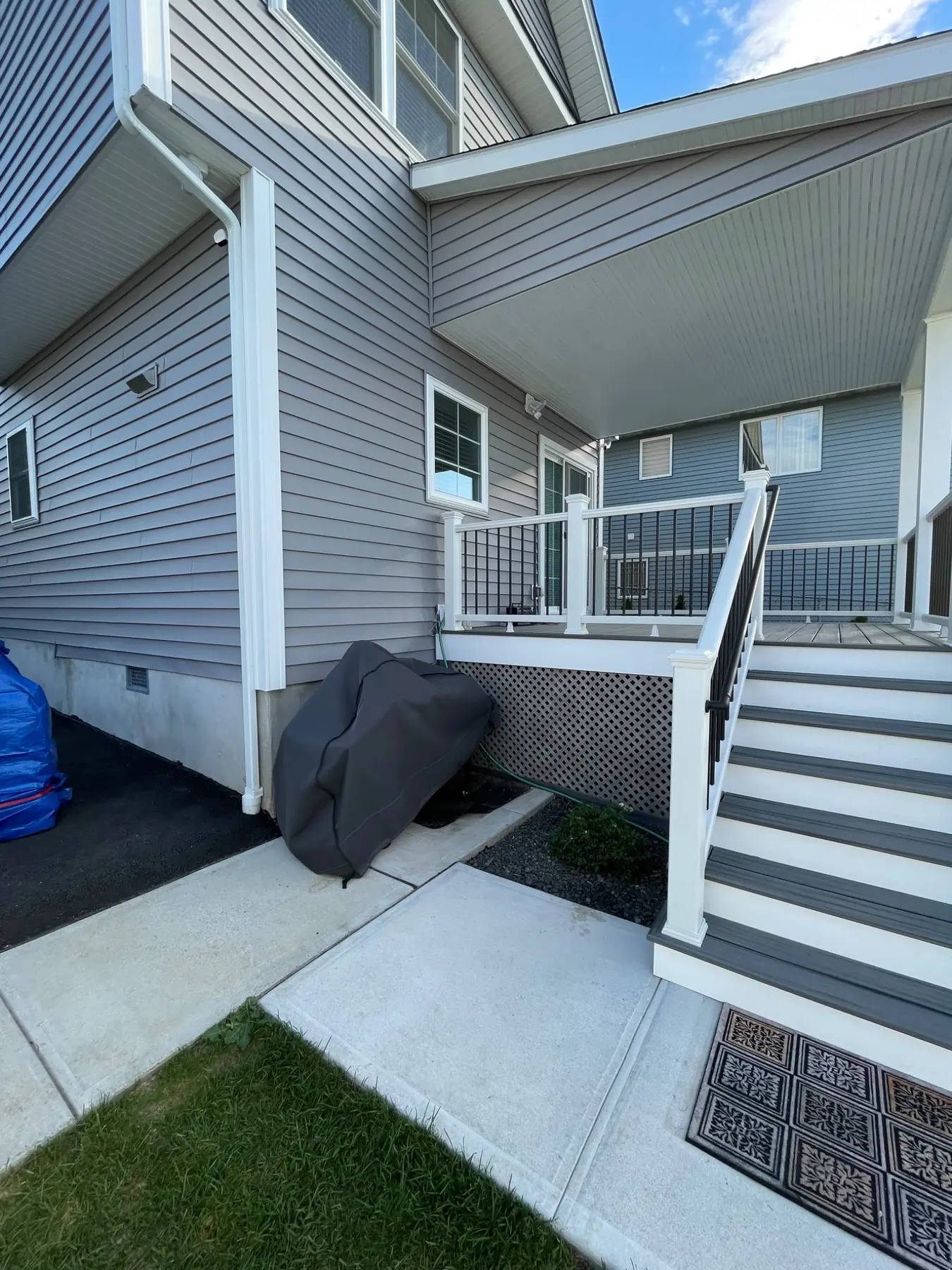 Finished composite stairs and covered landing