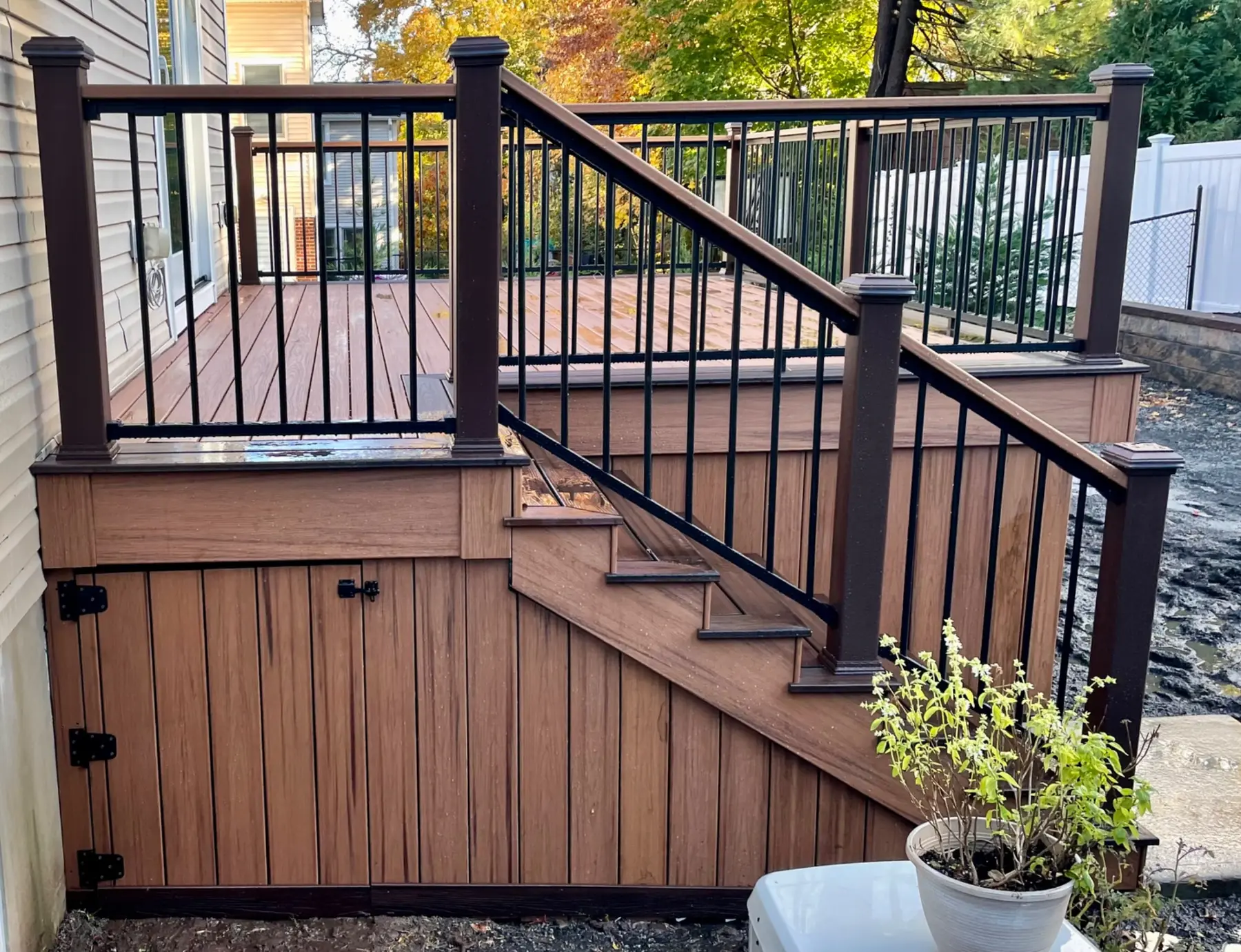 Composite stairs and enclosed under-deck storage