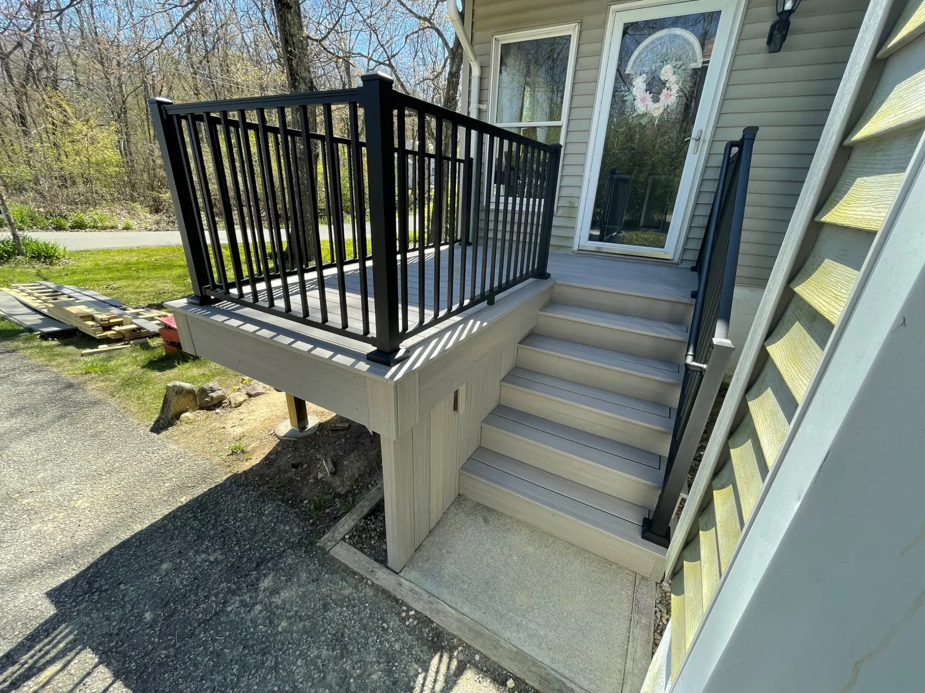 Composite entry stairs and small landing